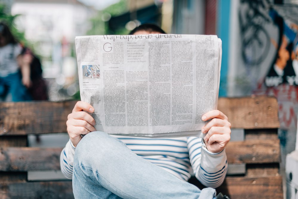 Stack of independent newspapers and press archive